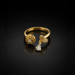Gold-Tone Floral Charm Ring – Butterfly & Crystal Drop Design