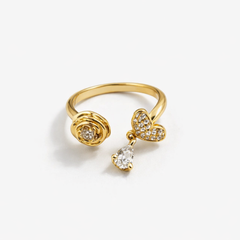 Gold-Tone Floral Charm Ring – Butterfly & Crystal Drop Design