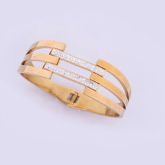 Golden Triple Band Bracelet with Crystal Detailing