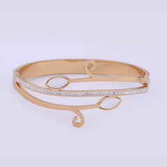 Elegant Rose Gold-Tone Vine Bangle with Crystal Pave and Cat's Eye Stones