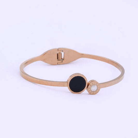 Elegant Golden Bracelet with Black & White Round Accents