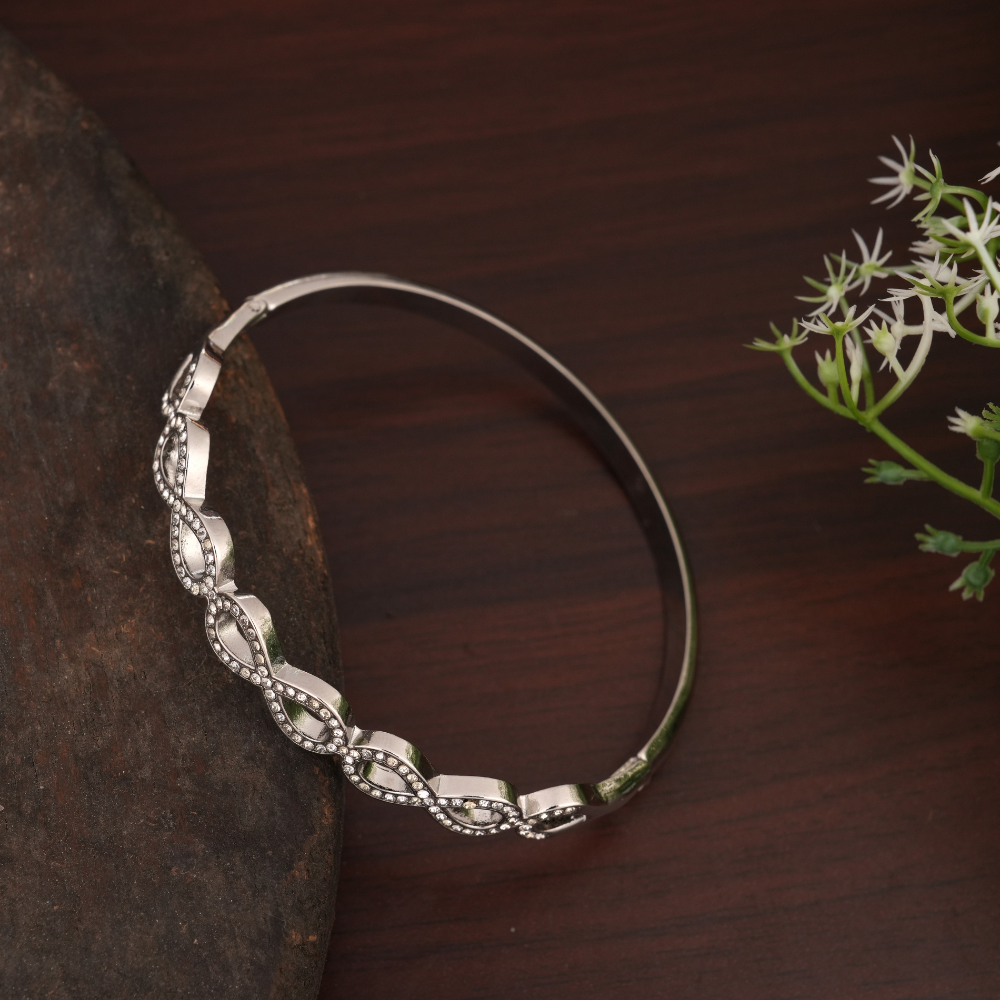 Infinity Bangle Design Silver-Tone Infinity Motif Bangle – Thejoe