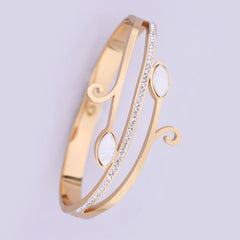 Elegant Rose Gold-Tone Vine Bangle with Crystal Pave and Cat's Eye Stones