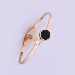 Elegant Golden Bracelet with Black & White Round Accents