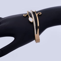 Elegant Rose Gold-Tone Vine Bangle with Crystal Pave and Cat's Eye Stones