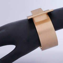 Modern Golden Wide Band Bracelet with Cut-Out Detail