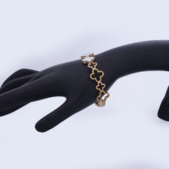 Elegant Gold-Toned Clover Design Bracelet with White Inlay
