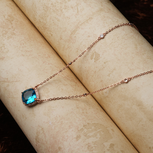 Rose Gold-Tone Blue Cushion-Cut Halo Pendant Necklace