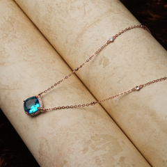 Rose Gold-Tone Blue Cushion-Cut Halo Pendant Necklace