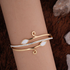 Elegant Rose Gold-Tone Vine Bangle with Crystal Pave and Cat's Eye Stones