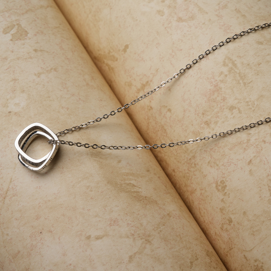 Interlocking Square Pendant Necklace (Silver-Tone)