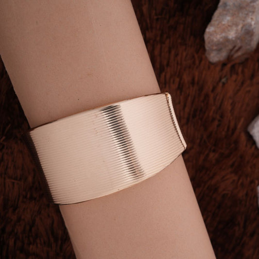 Elegant Wide Ribbed Gold-Tone Cuff Bracelet