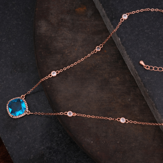 Rose Gold-Tone Blue Cushion-Cut Halo Pendant Necklace