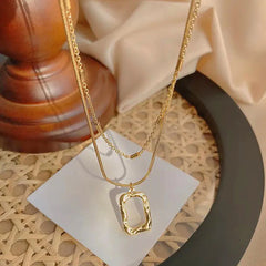 Layered Abstract Frame Pendant Necklace (Gold Tone)